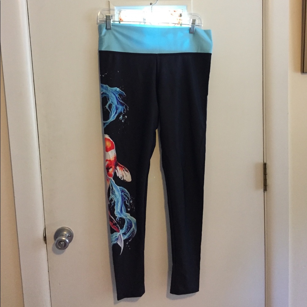 Koi Lotus leggings would fit L/XL