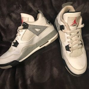 Jordan 4s cement gray.