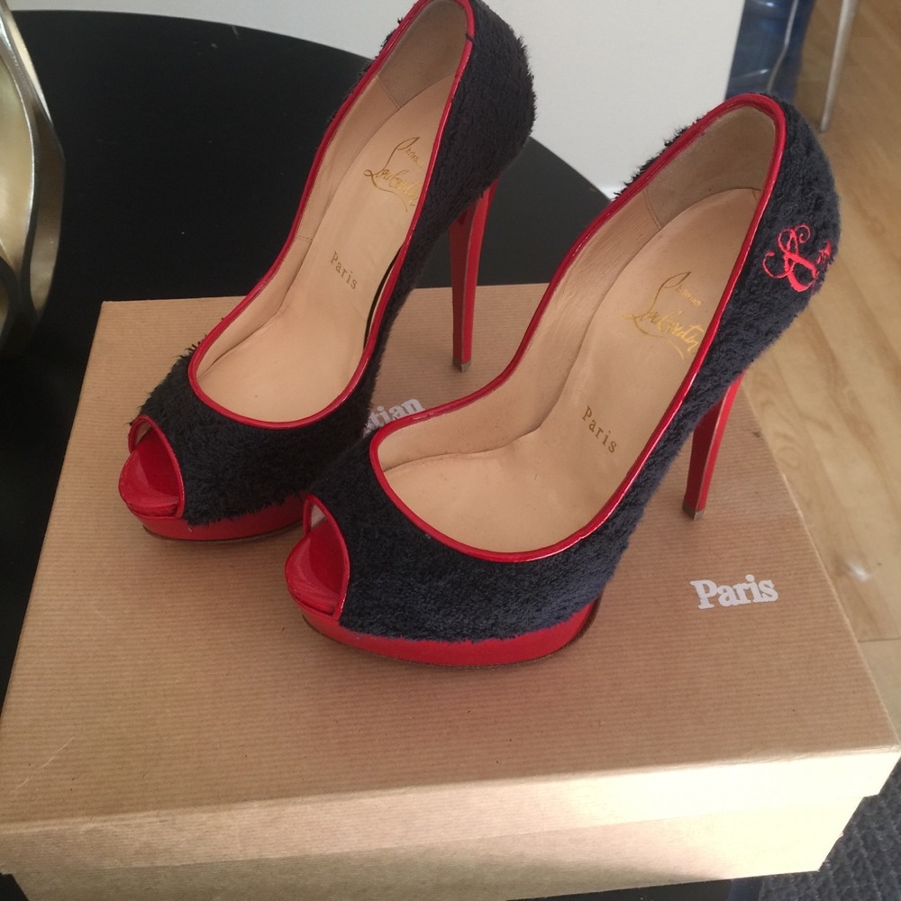 Christian louboutin peep toe pumps