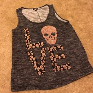 Sleeveless skull head top
