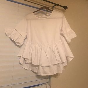 White ruffle shirt