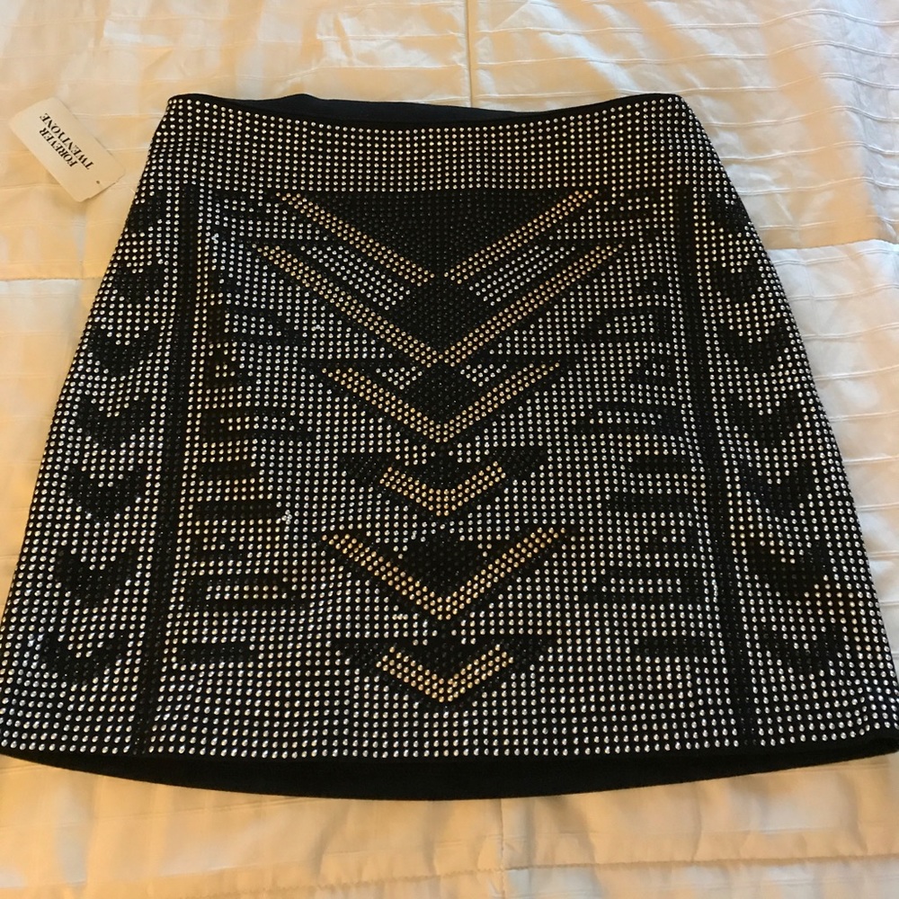 Black studded mini skirt