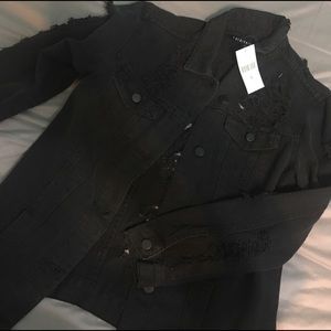 Distressed jean jacket