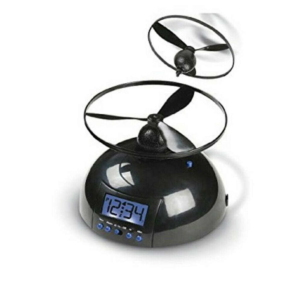 New in box.Flying alarm clock