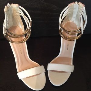 Size 5 Never worn white strap sexy heels w/ gold