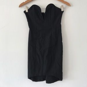 Plunging strapless black bodycon cocktail dress