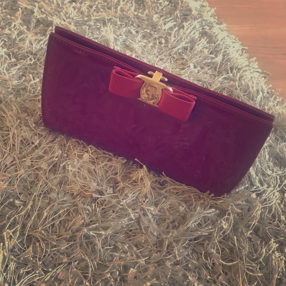 Red patent leather Ferragamo clutch