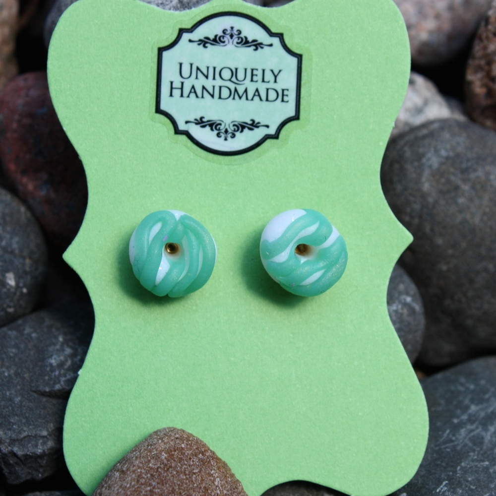Green iced donut earrings