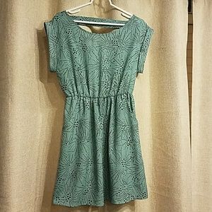 Teal and black open-back dress