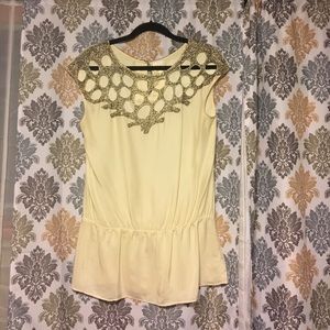 Cream Silk and beaded top.