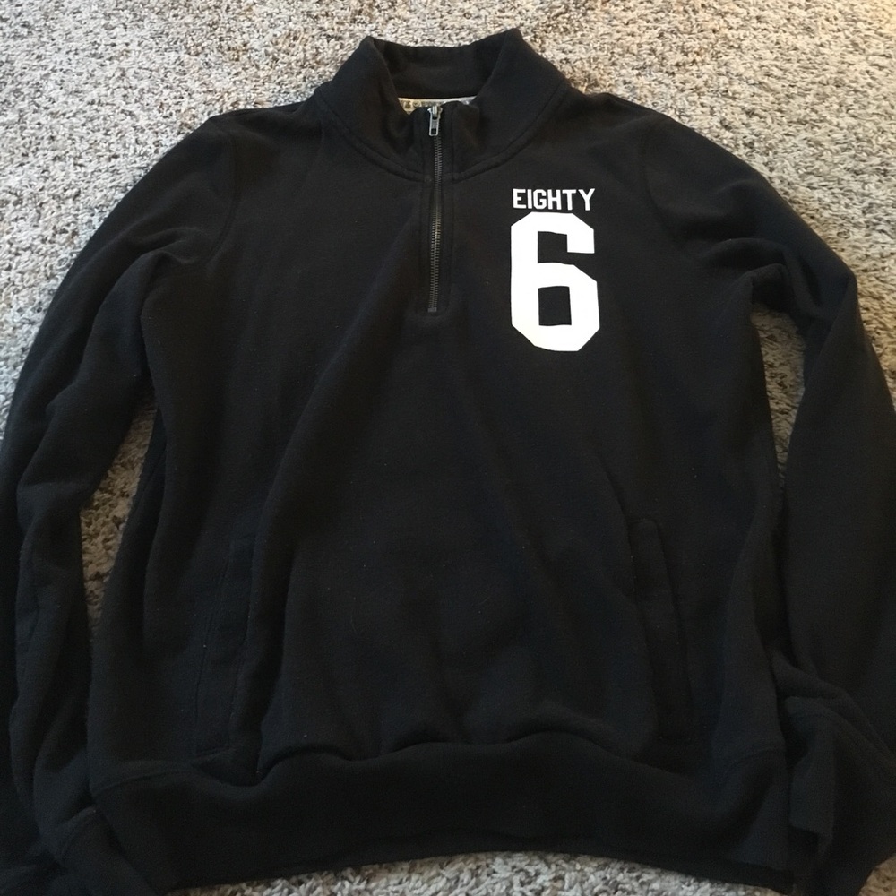 Pink half zip hoodie in black
