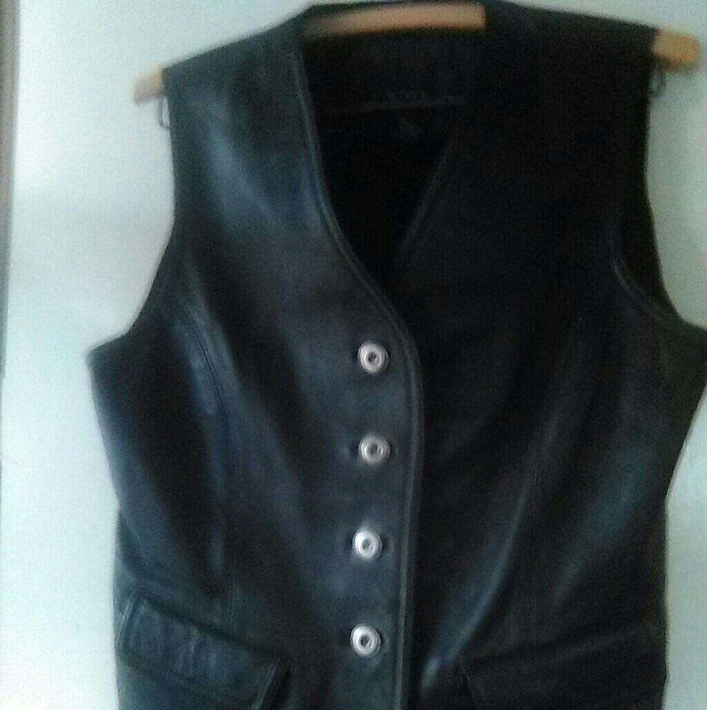 Black leather vest.