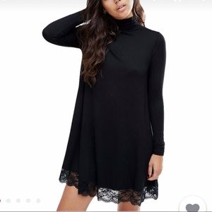 Black long sleeve dress with mock neck and lace