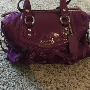 Purple Coach handbag with signature C detail