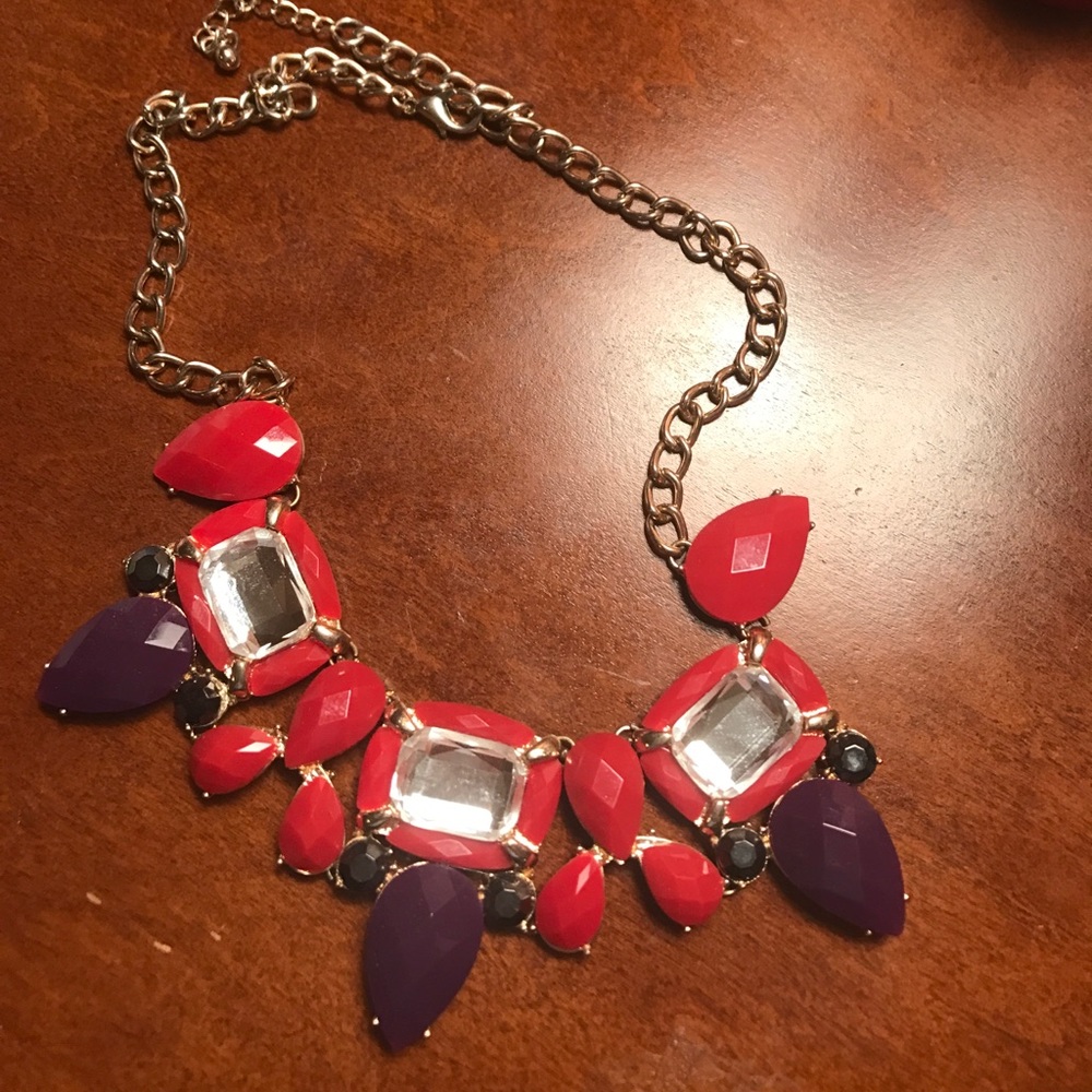 Red, purple and black accented statement necklace.