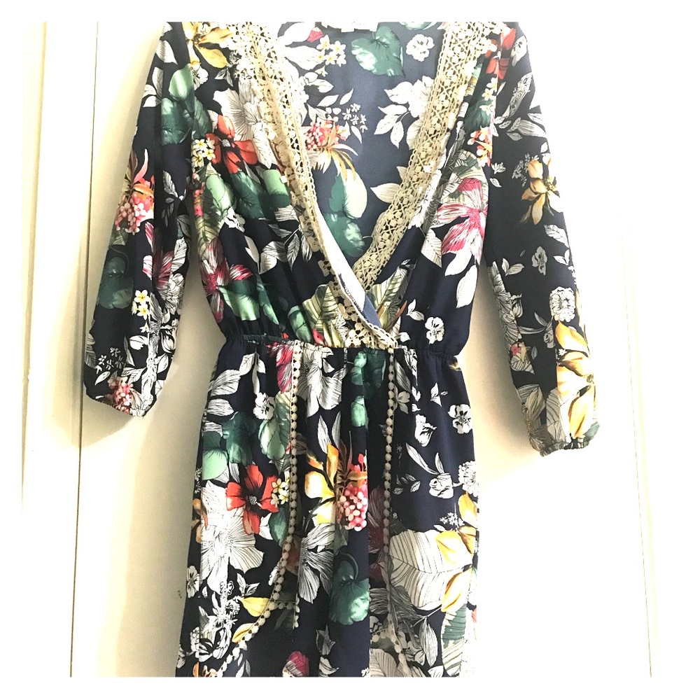 V Neck Navy blue floral romper .