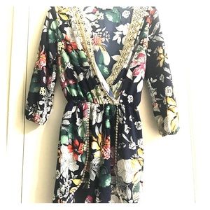V Neck Navy blue floral romper .