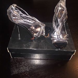 Brand new never worn Carlos Santana heels.