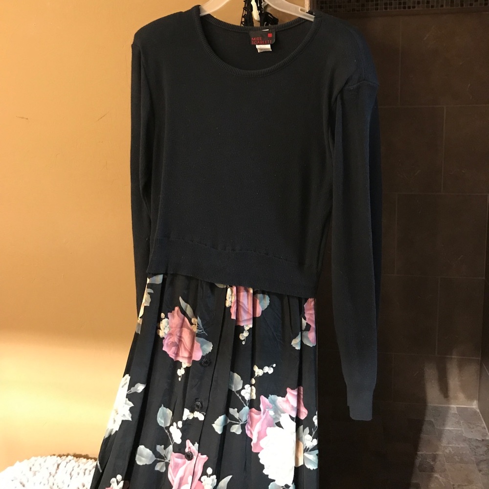 Black sweater and rose print dress