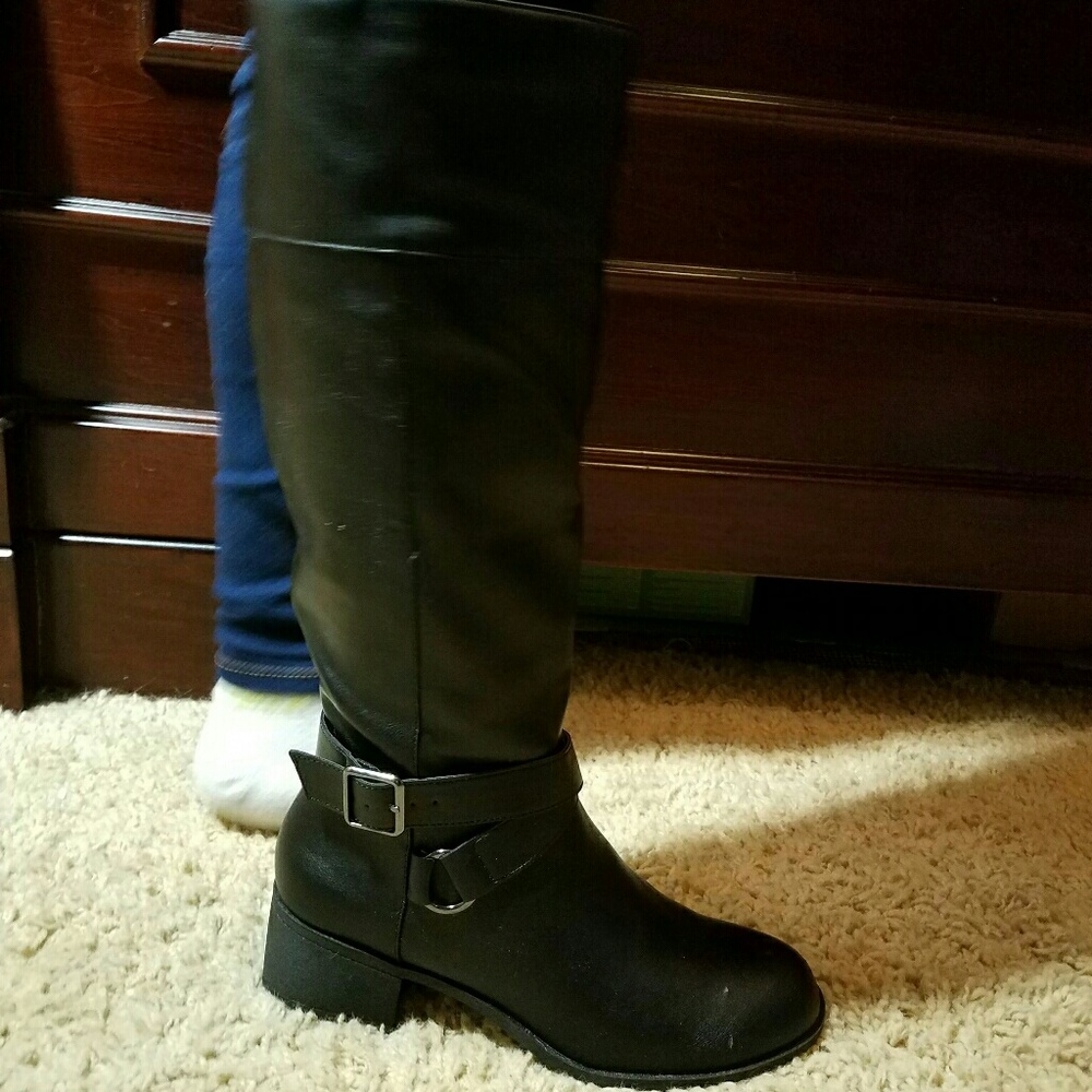 Black knee high boots with buckle
