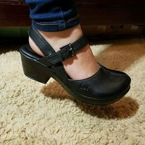black clogs with adorable buckle