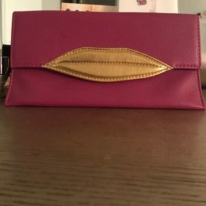 Faux leather clutch with chain strap