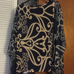Navy blue and gold print top with flowy sleeves