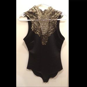 Black and gold bodysuit