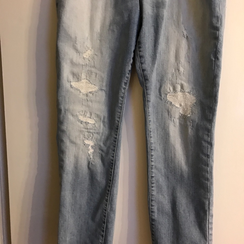 Torrid light wash jeans size 14 nice damaged look