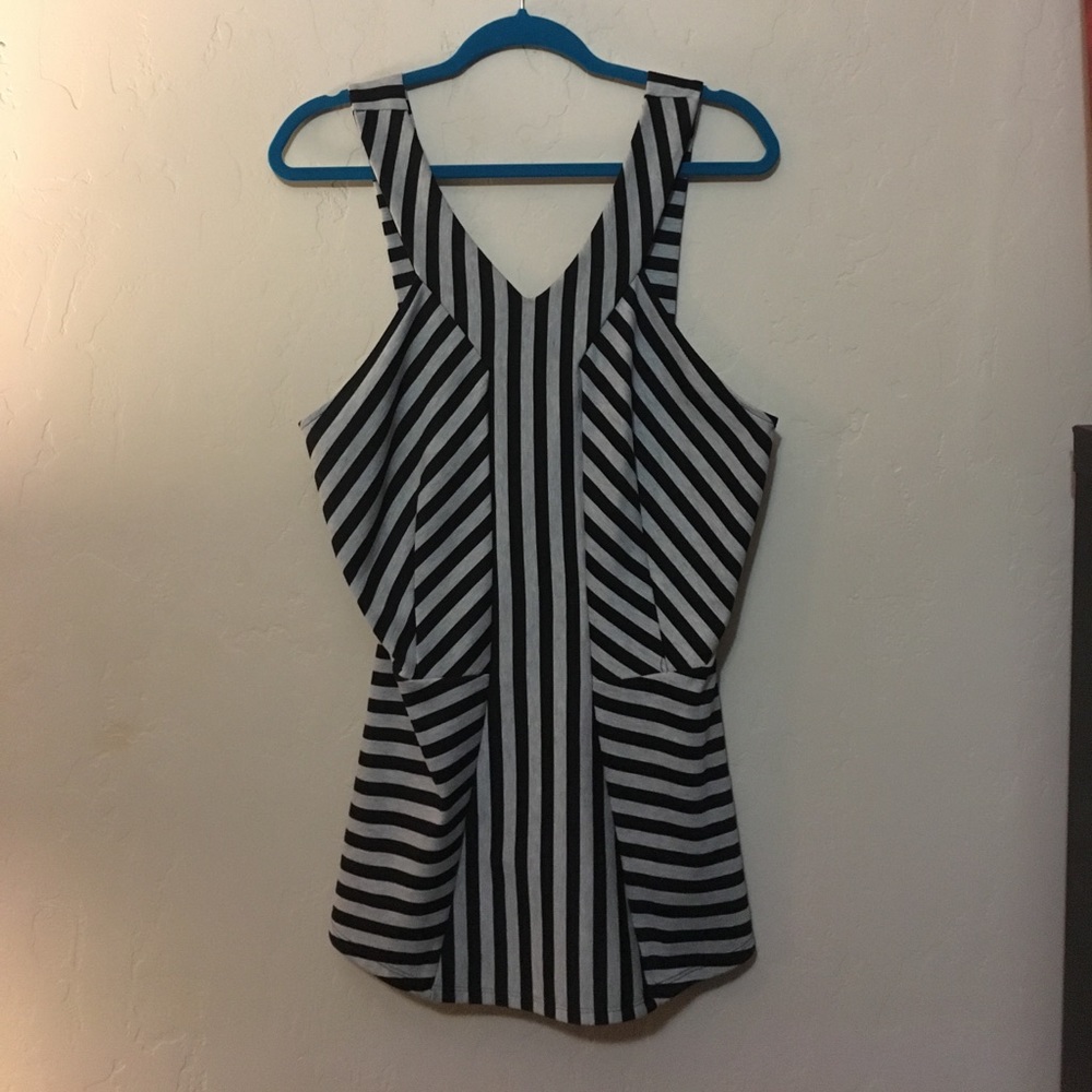 Torrid Black and gray peplum top.