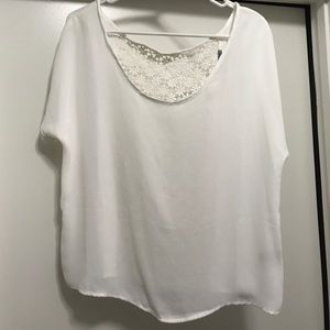 Sheer white top with flower back