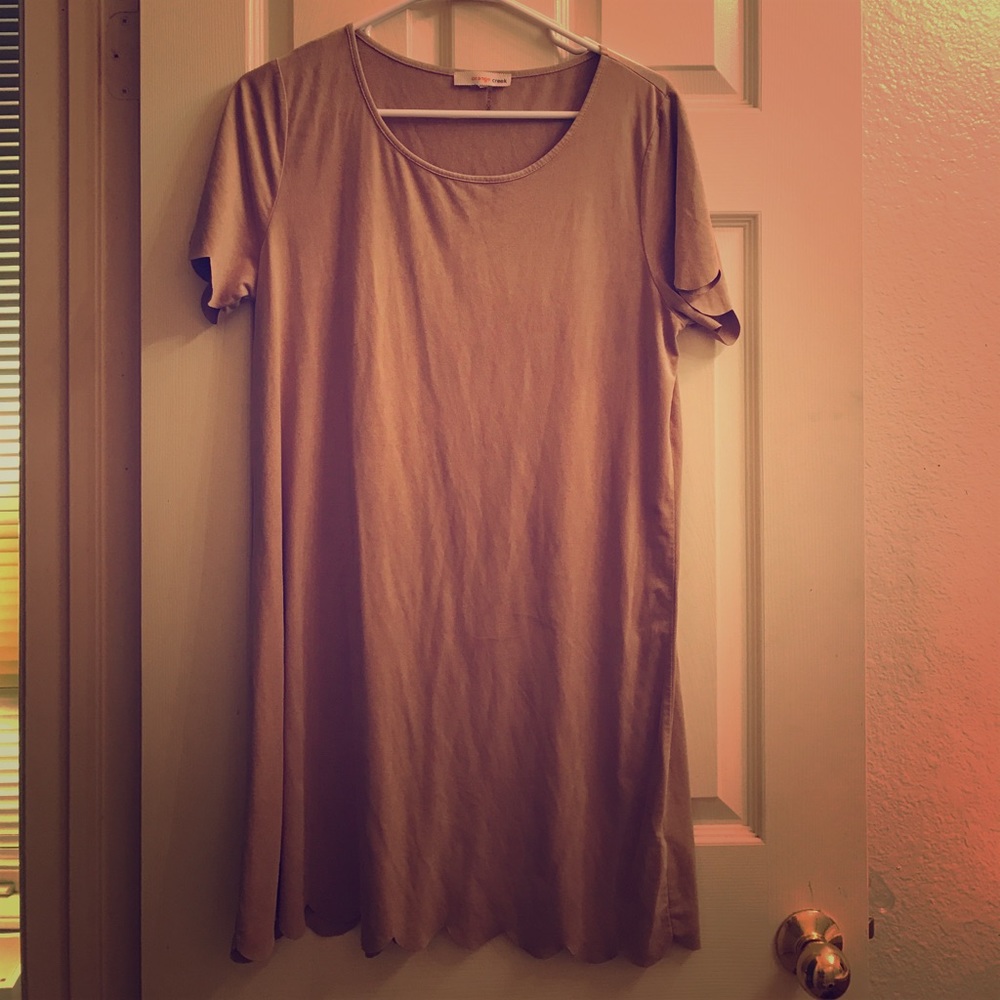 Nude shirt dress with scalloped hem and sleeves