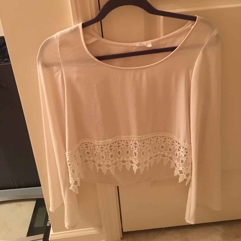 Crop top with lace accent and bell sleeves