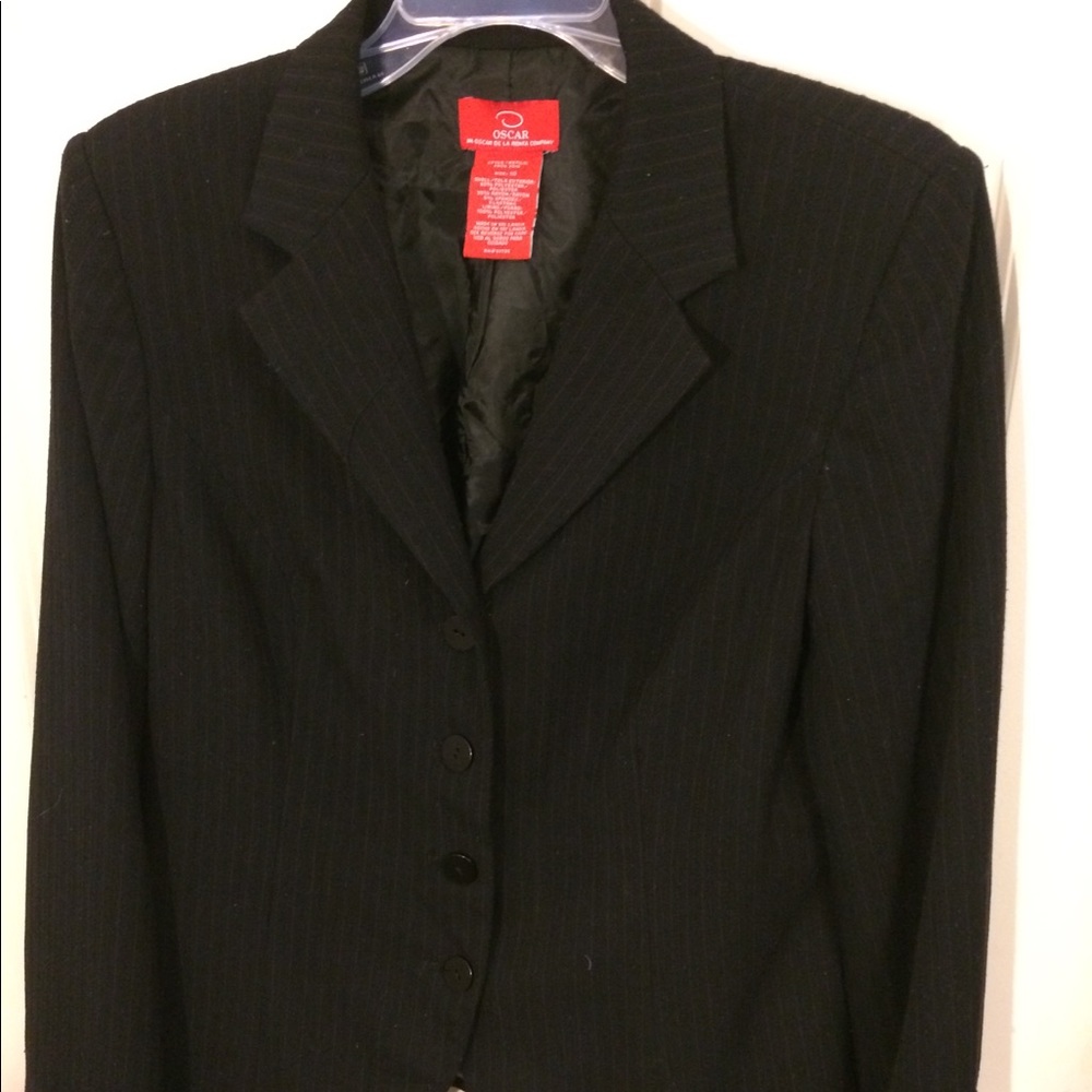 Black pinstriped woman’s short casual blazer
