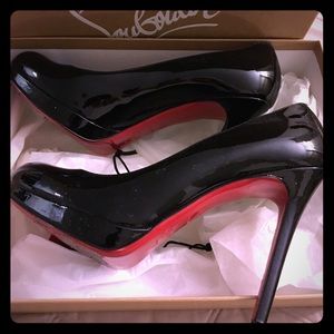 Louboutin black patent pumps