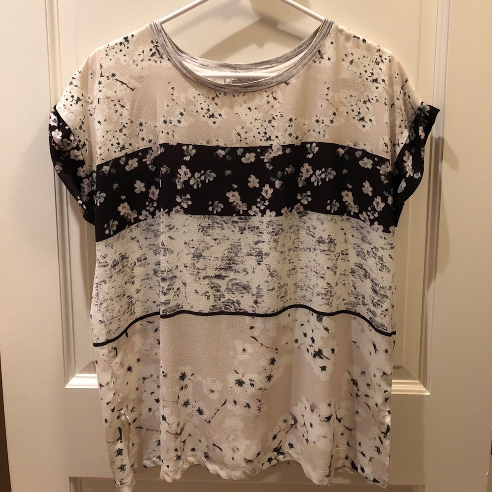 White and black floral shirt