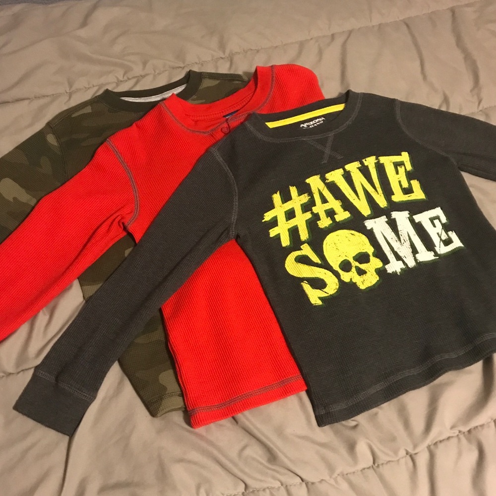 3 Long sleeve thermal shirts.