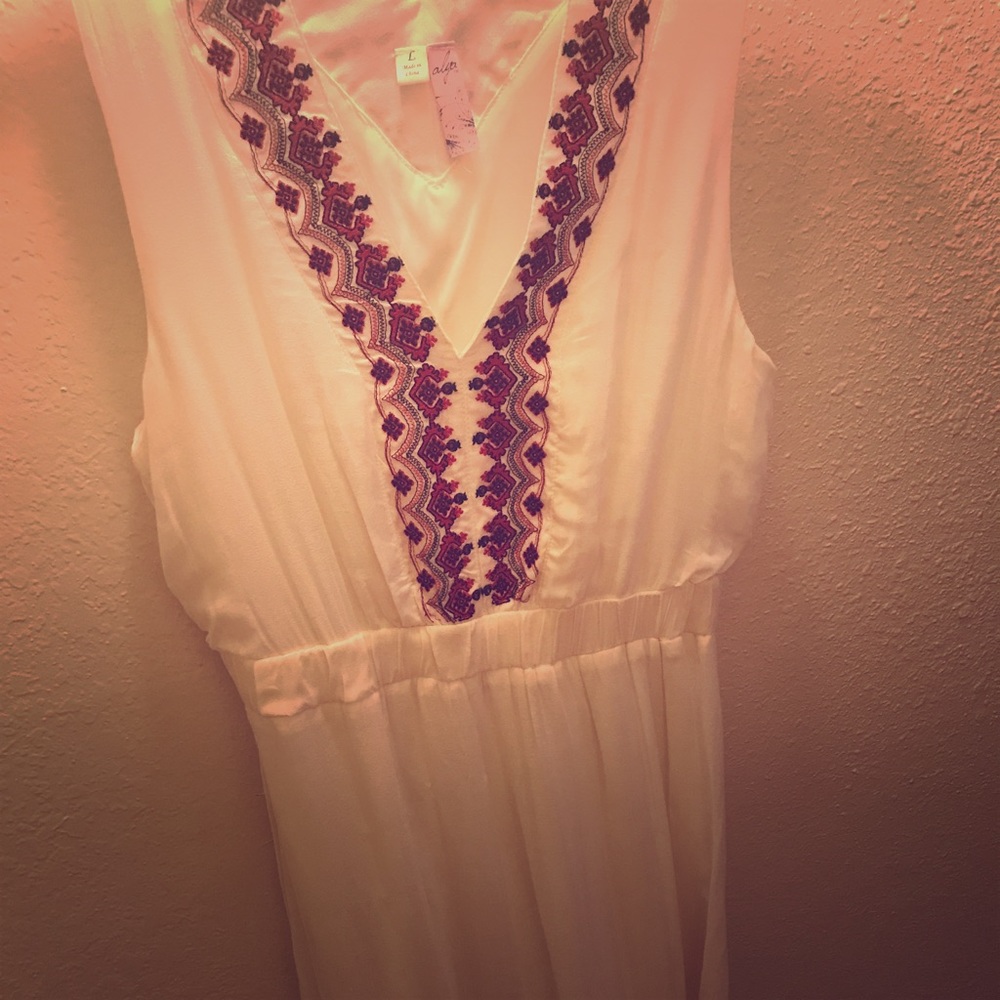 White maxi dress with pretty red and black details