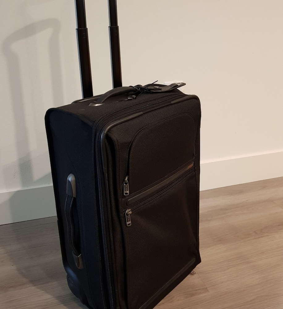 Tumi Suitcase (used less than 5 times) OBO