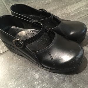 Worn Dankso Mary Janes clogs