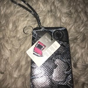 Kenneth Cole wrist wallet with mesh pockets