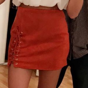Orange suede skirt