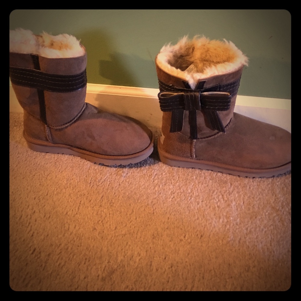 Ugg boots worn one time. Small scuff on top of one