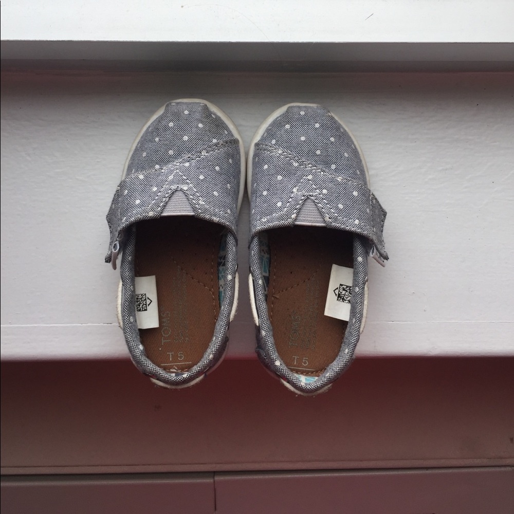 Toms blue shoes with white polka dots. Size 5.