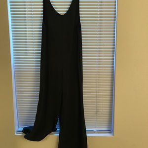 Black low back bell bottom jumpsuit