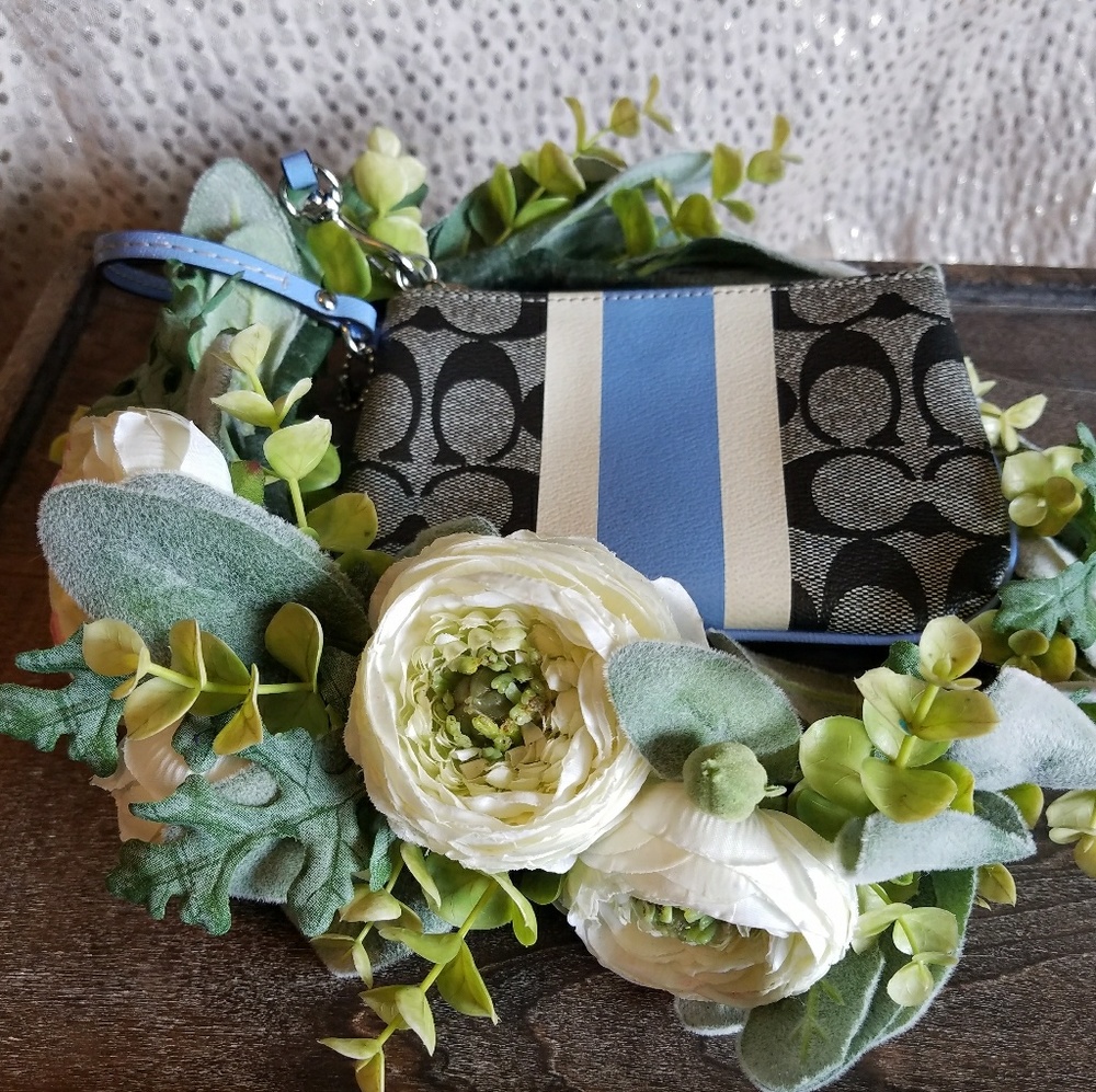 Coach wristlet signature with light blue stripe