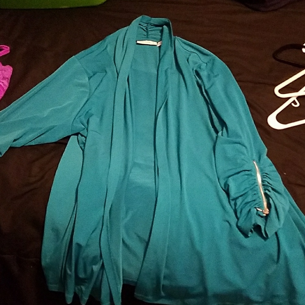 Cardigan teal in color
