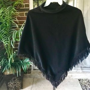 Black poncho shawl with tassels and turtleneck