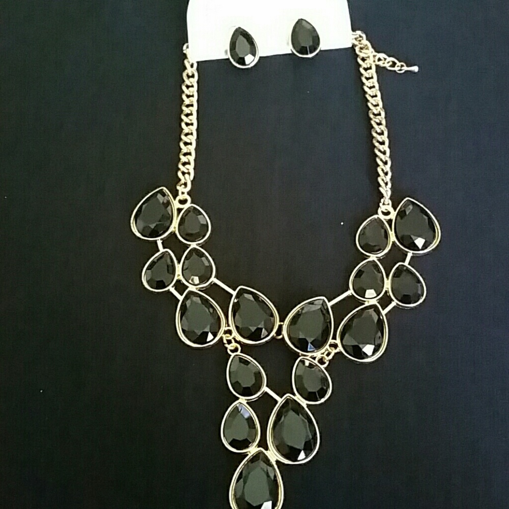 2 piece black in  gold setting