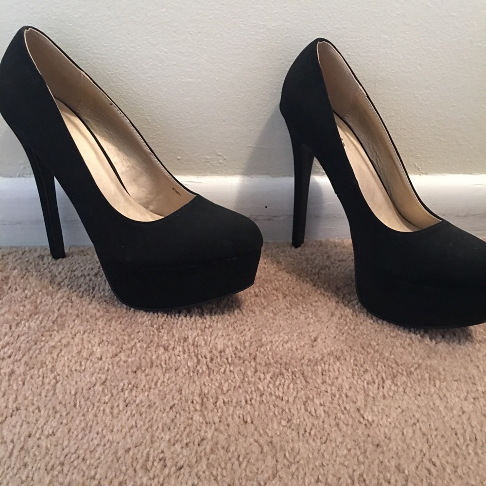 Close toed black high heels